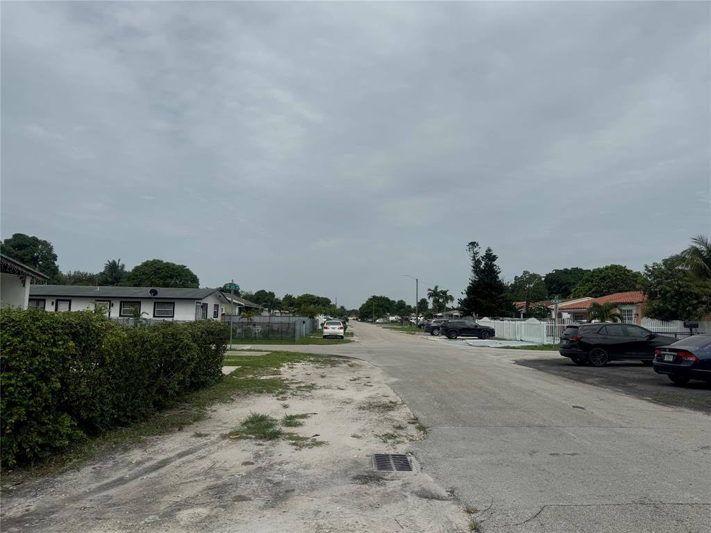 2986 Northwest 91st Street Miami, FL 33147 - Photo 39 of 40 a view of a street in front of a house