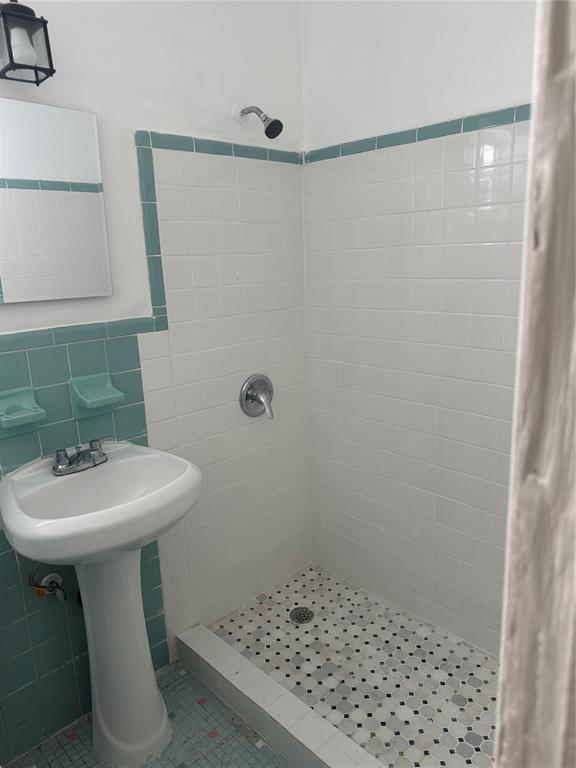 2986 Northwest 91st Street Miami, FL 33147 - Photo 8 of 40 a bathroom with a sink a toilet and shower