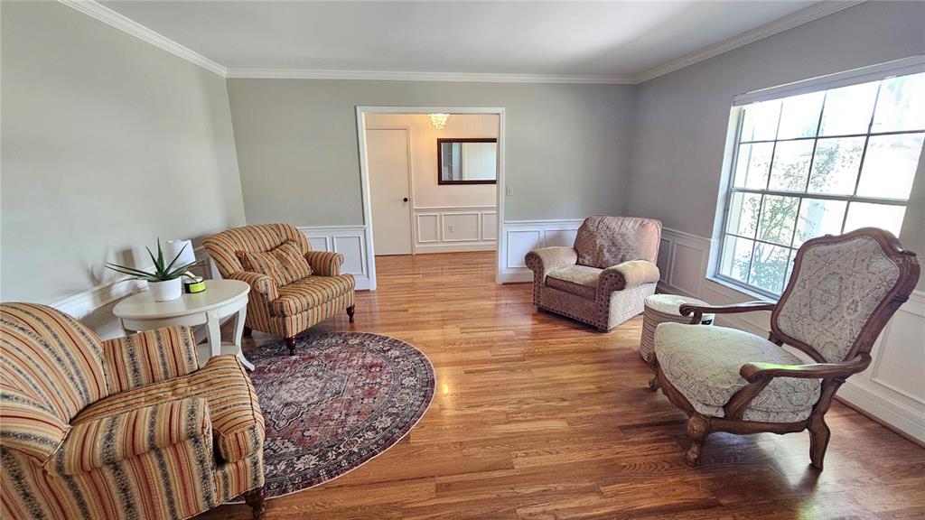 184 Lake Otis Road Winter Haven, FL 33884 - Photo 7 of 31 a living room with furniture and a window