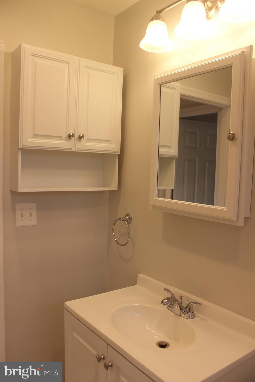 1907 Madison Road Baltimore, MD 21222 - Photo 21 of 47 First floor bath w/ extra storage cabinet.