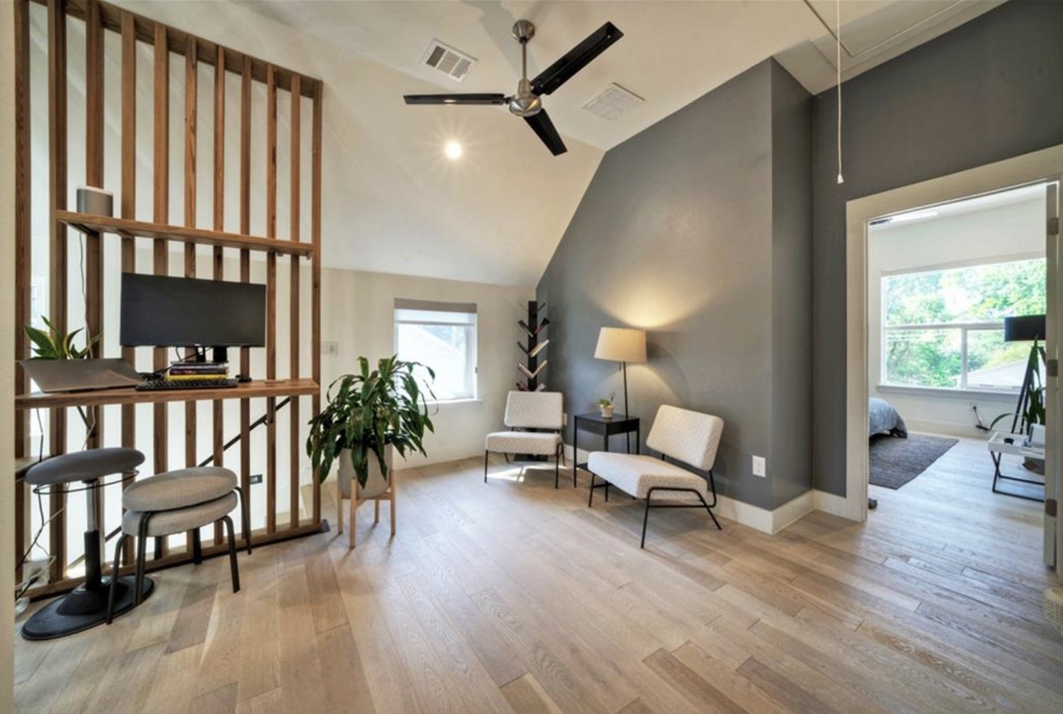 4608 Santa Anna Street, Unit 1 Austin, TX 78721 - Photo 16 of 35 Upstairs landing area with a custom-built desk
