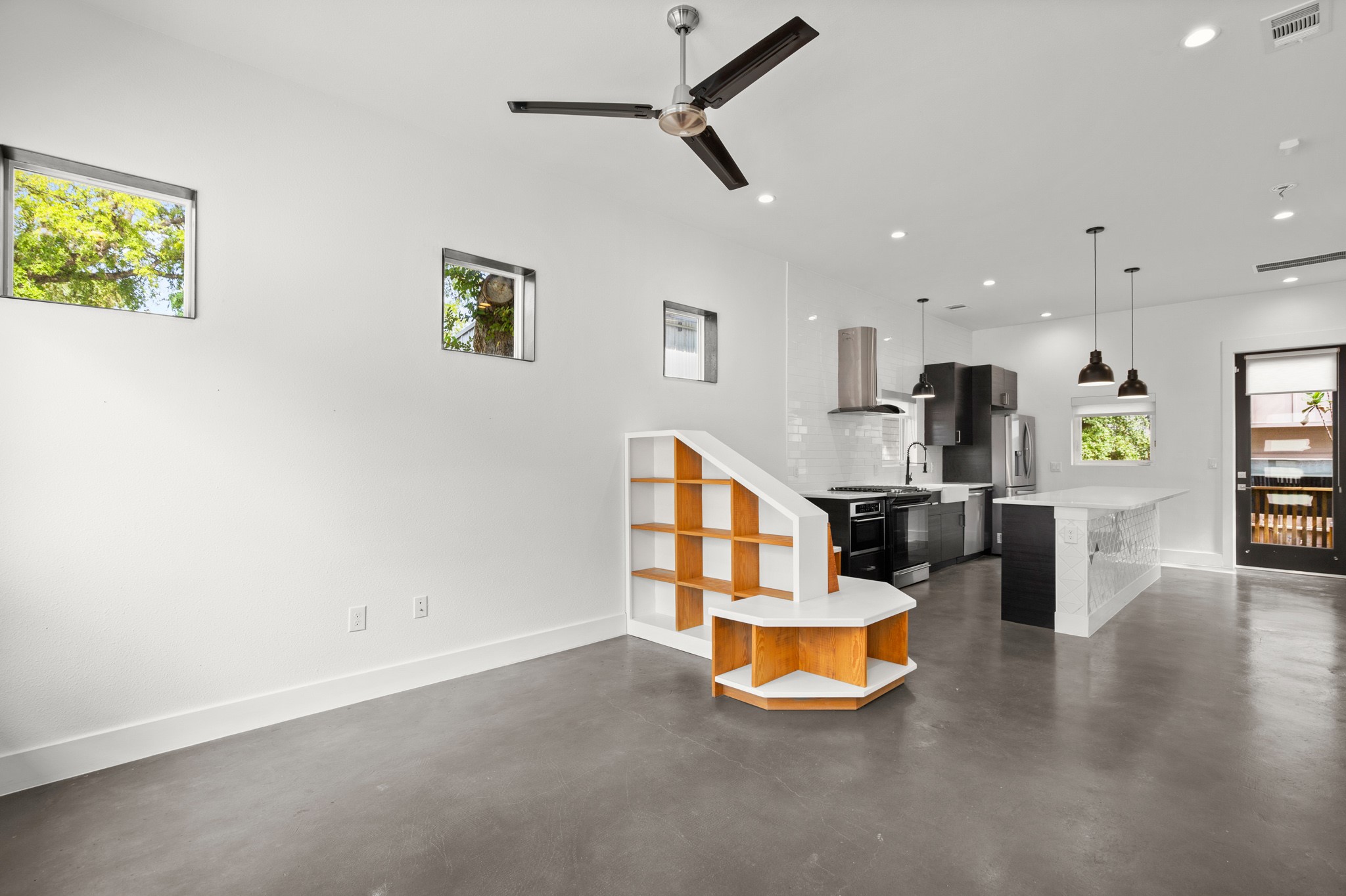 4608 Santa Anna Street, Unit 1 Austin, TX 78721 - Photo 7 of 35 The other side of the dining nook has a custom book shelf