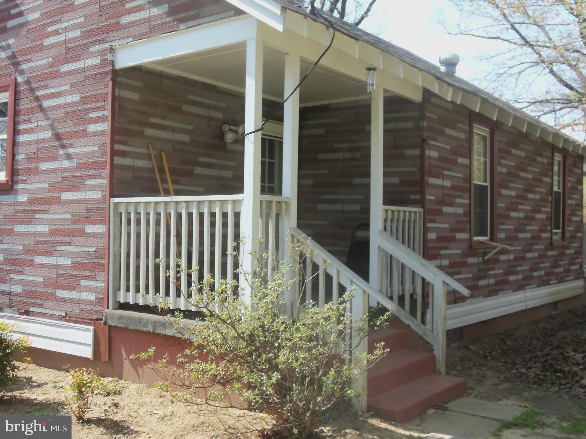 6203 Kirby Road Clinton, MD 20735 - Photo 7 of 26 Or for more privacy, relax on the side porch.