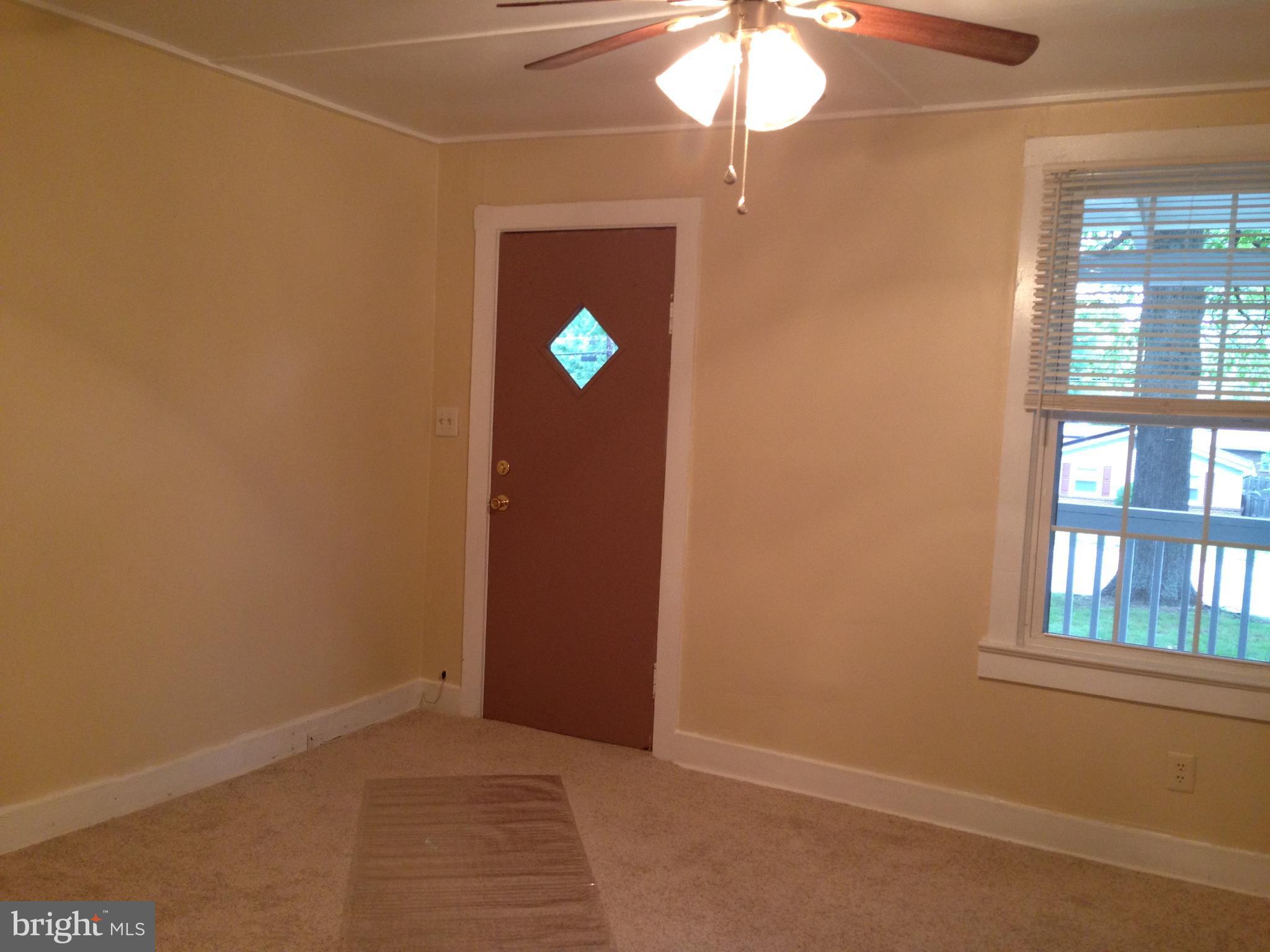 6203 Kirby Road Clinton, MD 20735 - Photo 9 of 26 Living room has new carpeting.