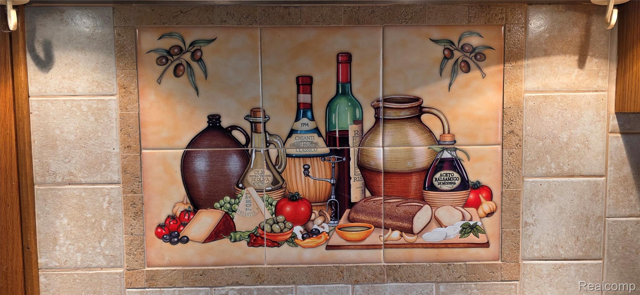 14062 Sanford Road Addison, MI 49220 - Photo 8 of 61 Decorative tiled backsplash mural featuring a still life motif