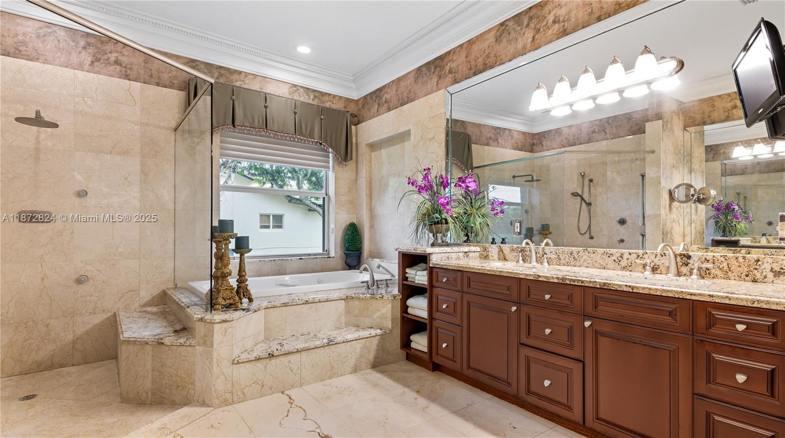 13040 Southwest 30th Court Davie, FL 33330 - Photo 17 of 42 a bathroom with a sink mirror and a bathtub