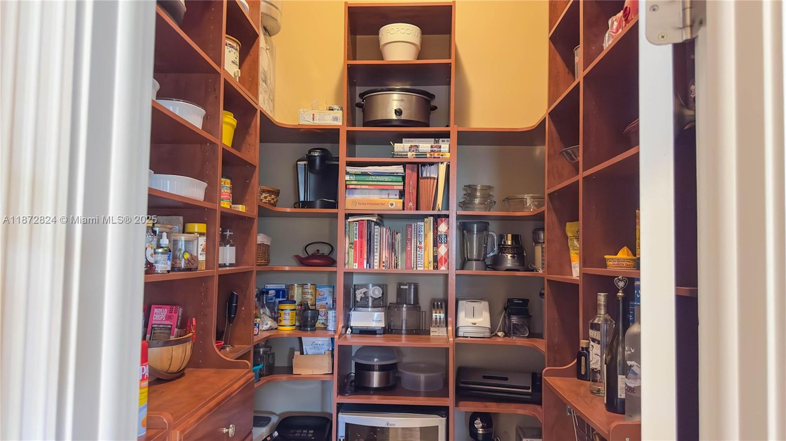 13040 Southwest 30th Court Davie, FL 33330 - Photo 27 of 42 a view of a room with shelves