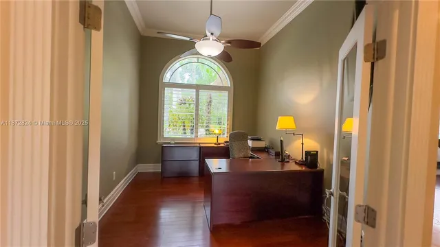a view of a livingroom with furniture window and wooden floor