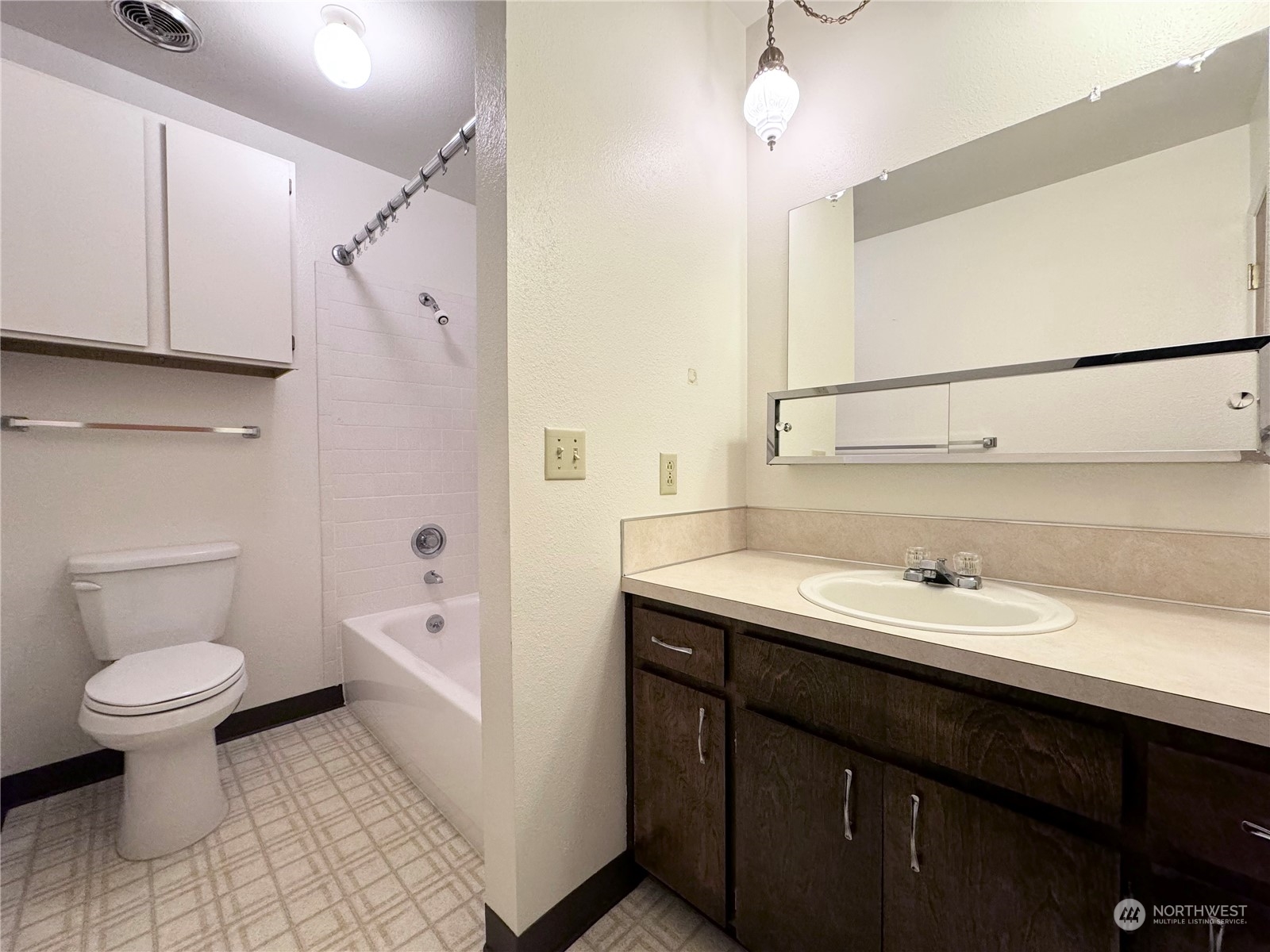 4610 Windemere Street Longview, WA 98632 - Photo 8 of 16 a bathroom with a sink a toilet and shower