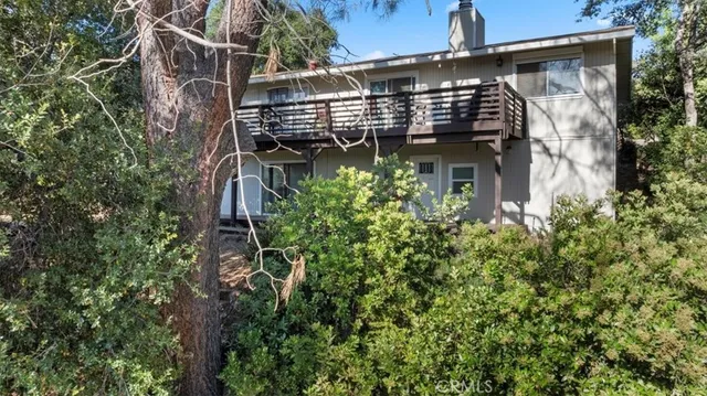 front view of a house with a small yard