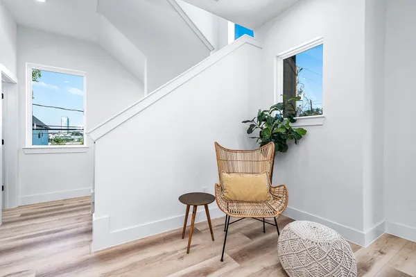 a kitchen with granite countertop a sink appliances cabinets and a counter top space