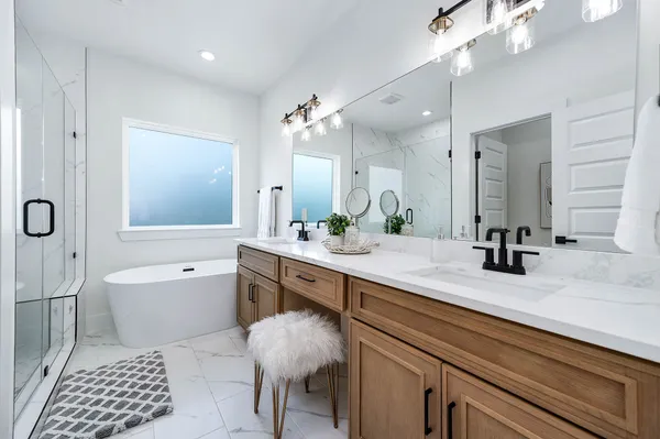a bathroom with a sink vanity and mirror