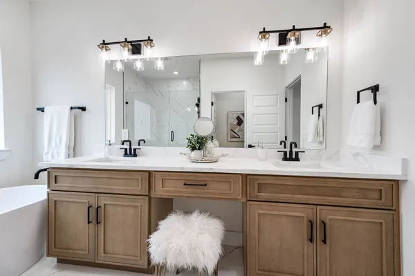 a bathroom with a bathtub and a window