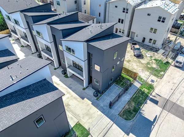 a aerial view of a building with a garden and plants