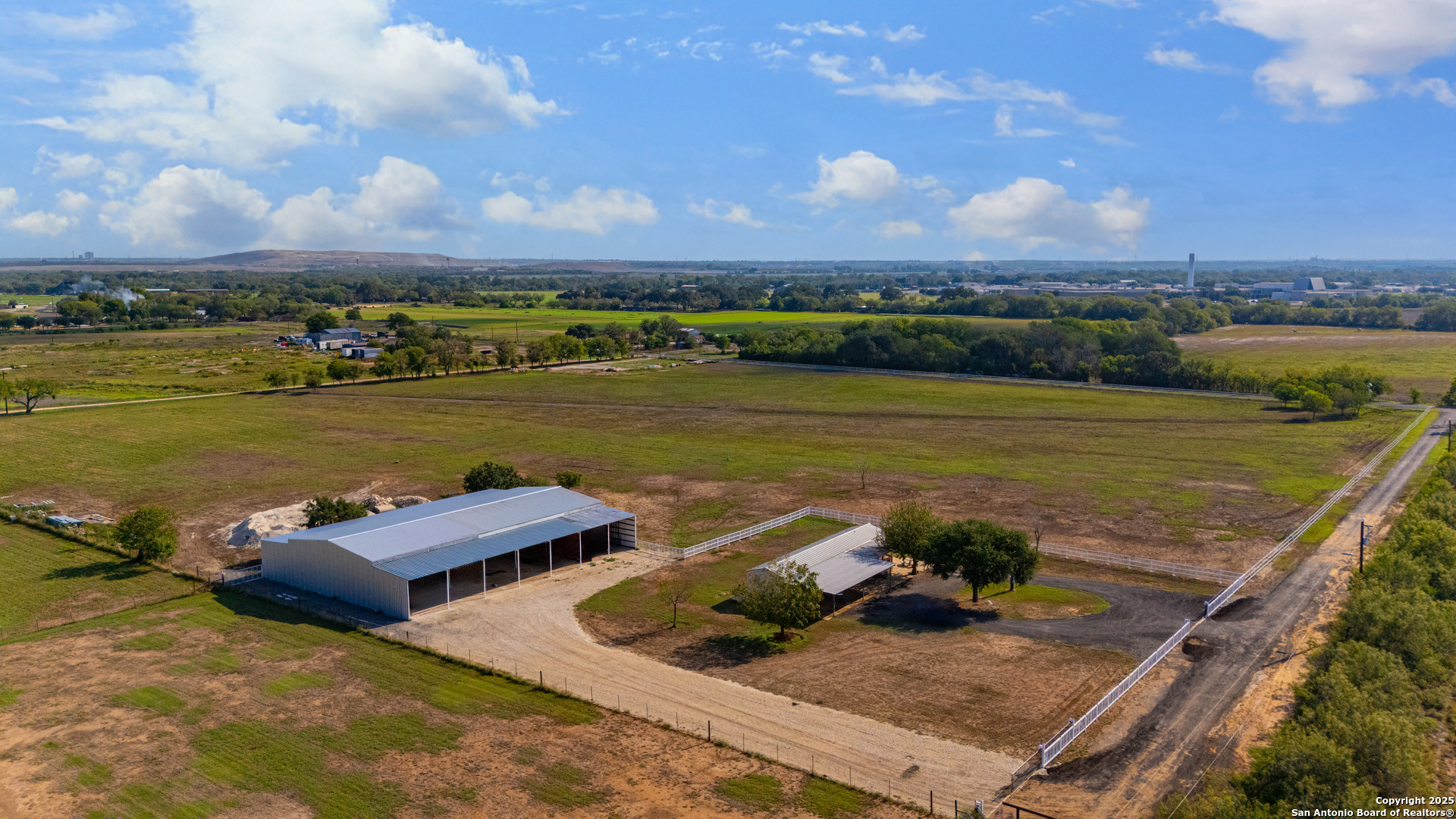 11706-11791 Kinney Road Atascosa, TX 78002 - Photo 13 of 35 an aerial view of a house with a ocean view