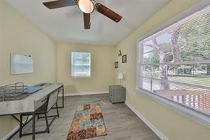5117 North Rome Avenue Tampa, FL 33603 - Photo 5 of 9 a living room with furniture and a window
