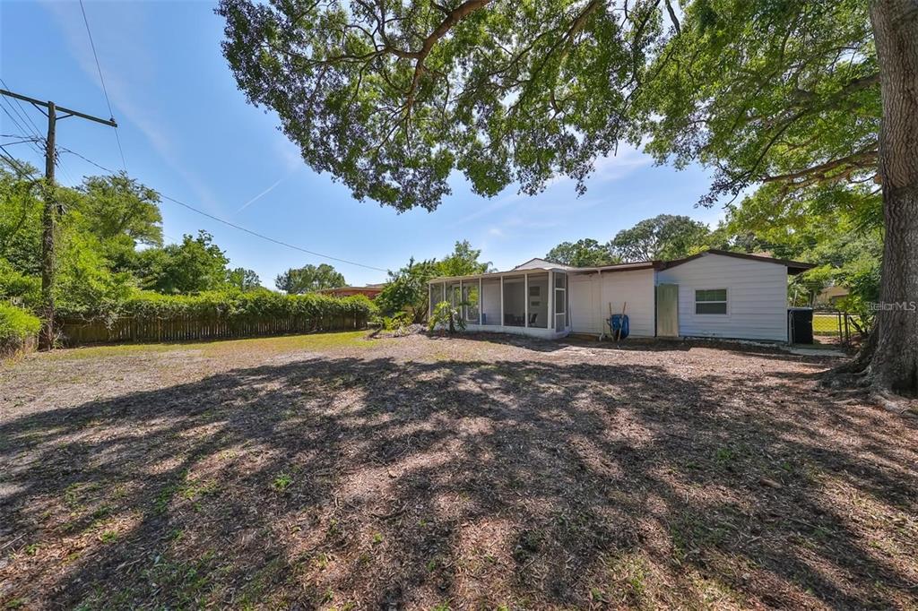 5117 North Rome Avenue Tampa, FL 33603 - Photo 8 of 9 a view of a house with a yard