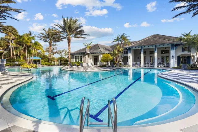 a view of a house with swimming pool