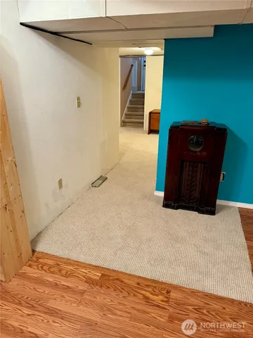 a view of entryway with wooden floor