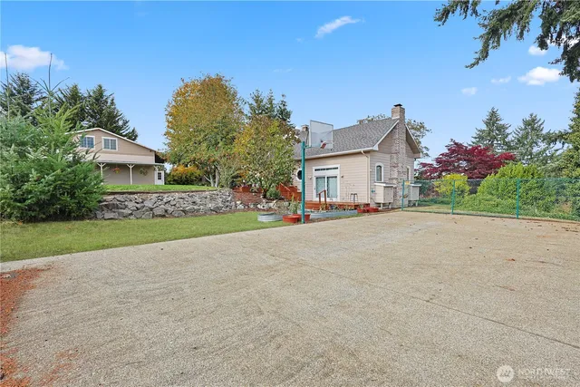 a view of house with outdoor space and street view