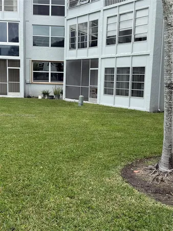 a large building with a garden