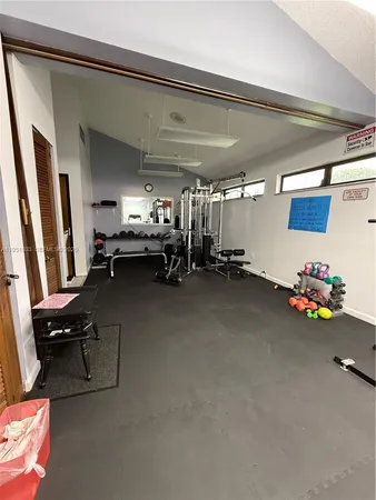 a view of a room with gym equipment