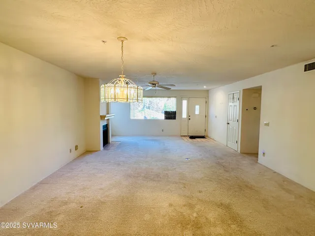 a view of a room with windows