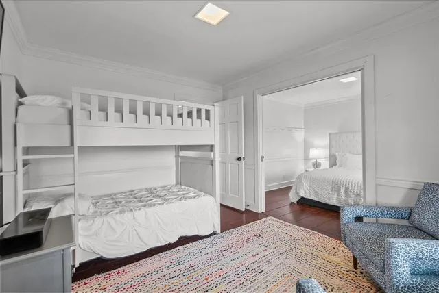 a bedroom with a bed and walk in closet