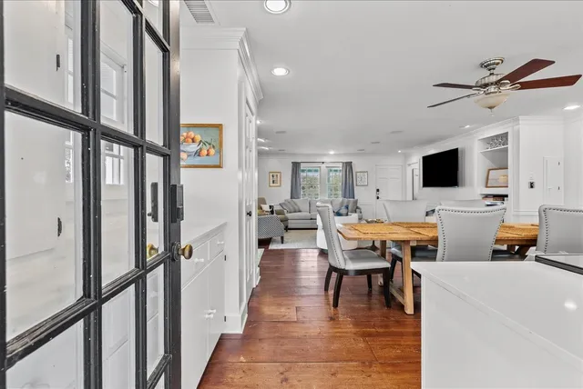 a view of a livingroom with furniture and a flat screen tv