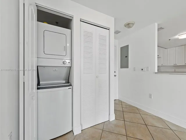 a view of a balcony with furniture