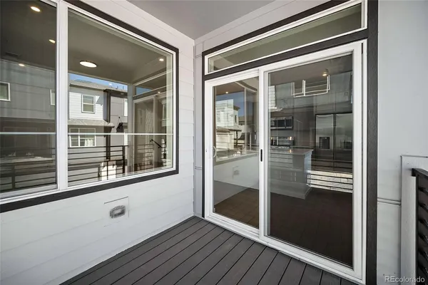 a view of a balcony from a living room