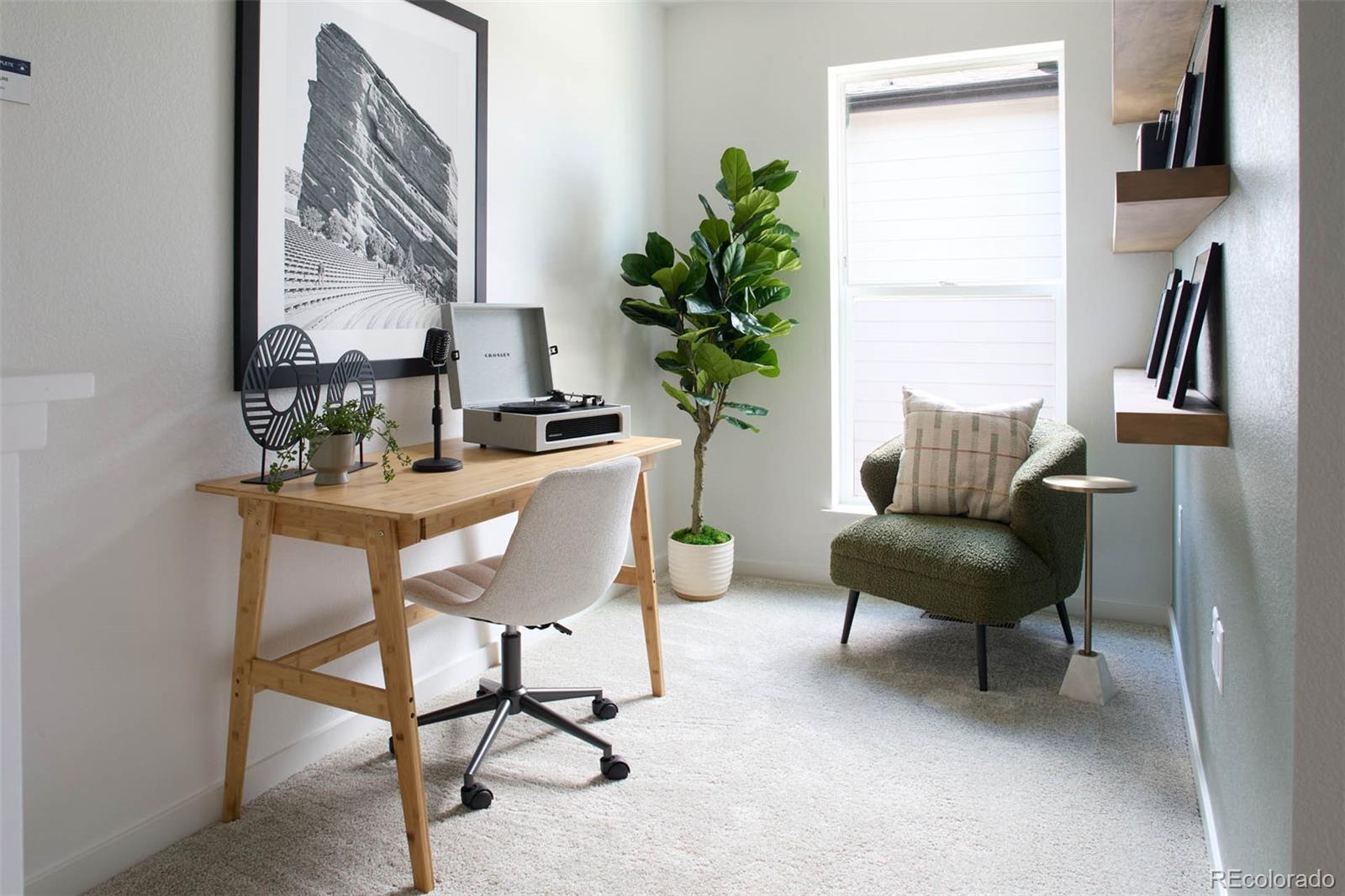 11964 Soprano Trail Lone Tree, CO 80134 - Photo 5 of 11 a work room with furniture and a potted plant