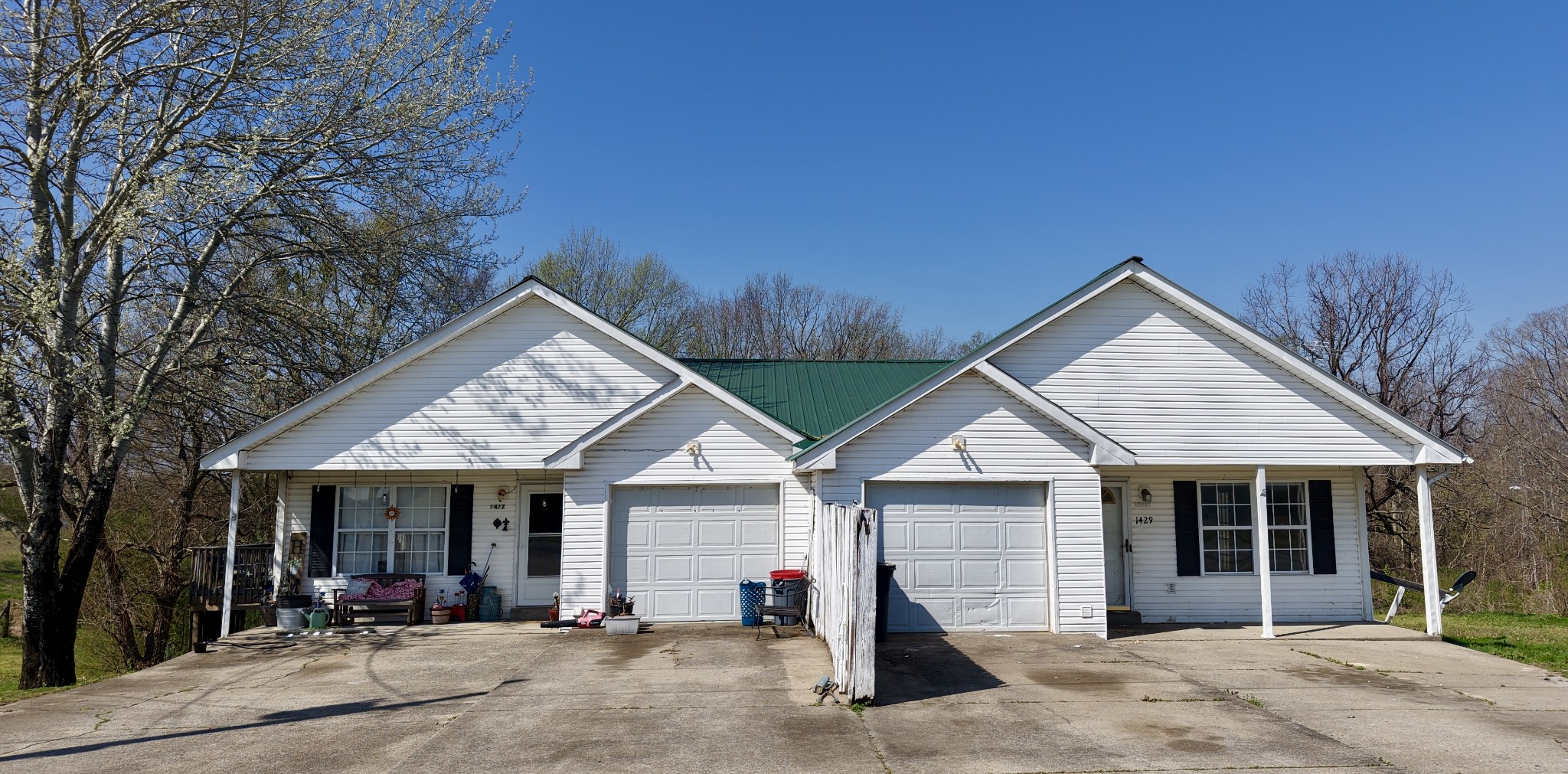 1431 Old Charlotte Road White Bluff, TN 37187 - Photo 6 of 8 a view of a house with yard and garage