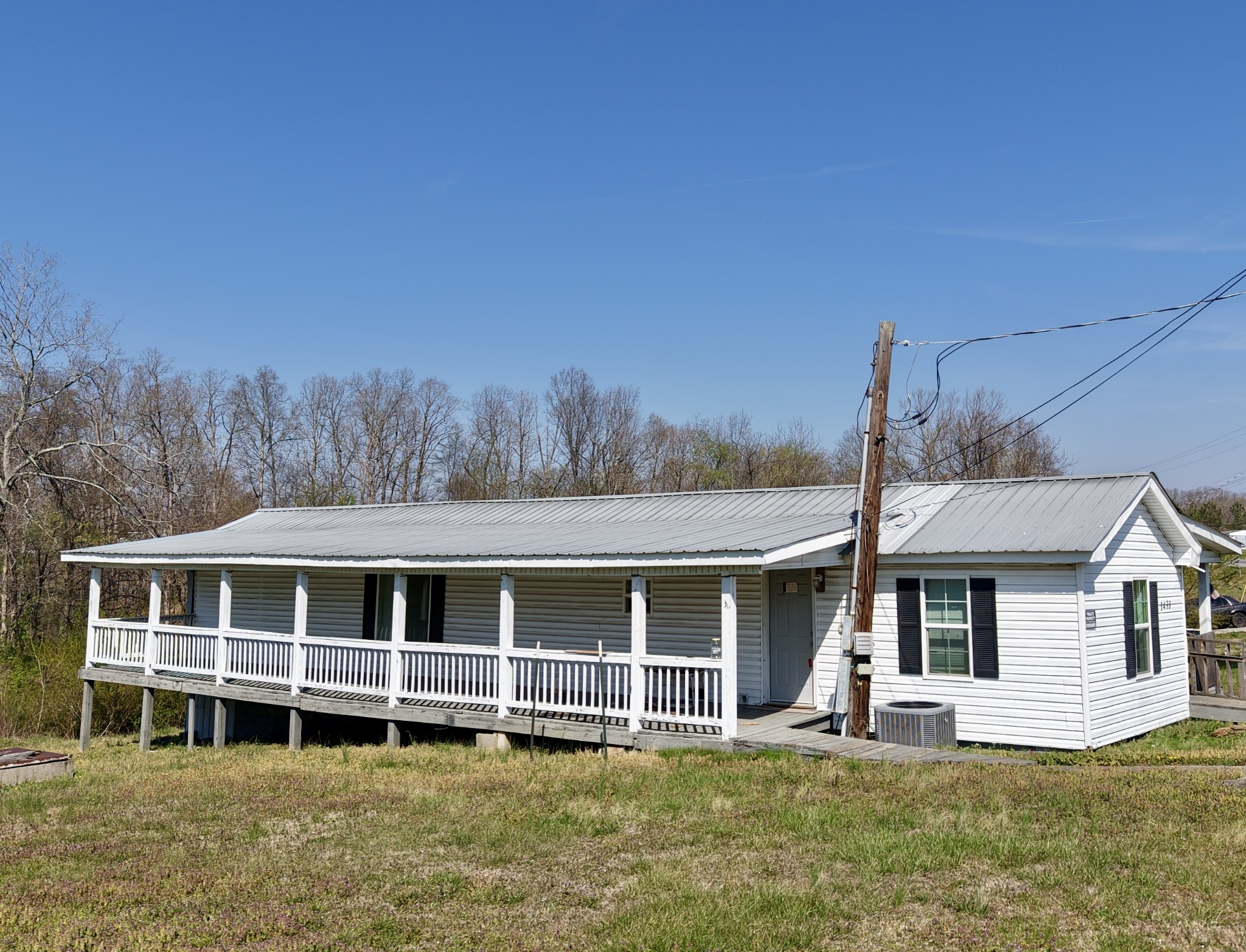 1431 Old Charlotte Road White Bluff, TN 37187 - Photo 8 of 8 a front view of a house with a yard
