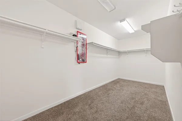 a view of a room with racks on the wall