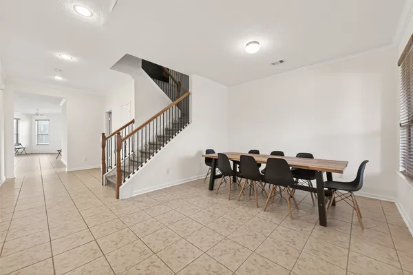 a view of a dining room with furniture