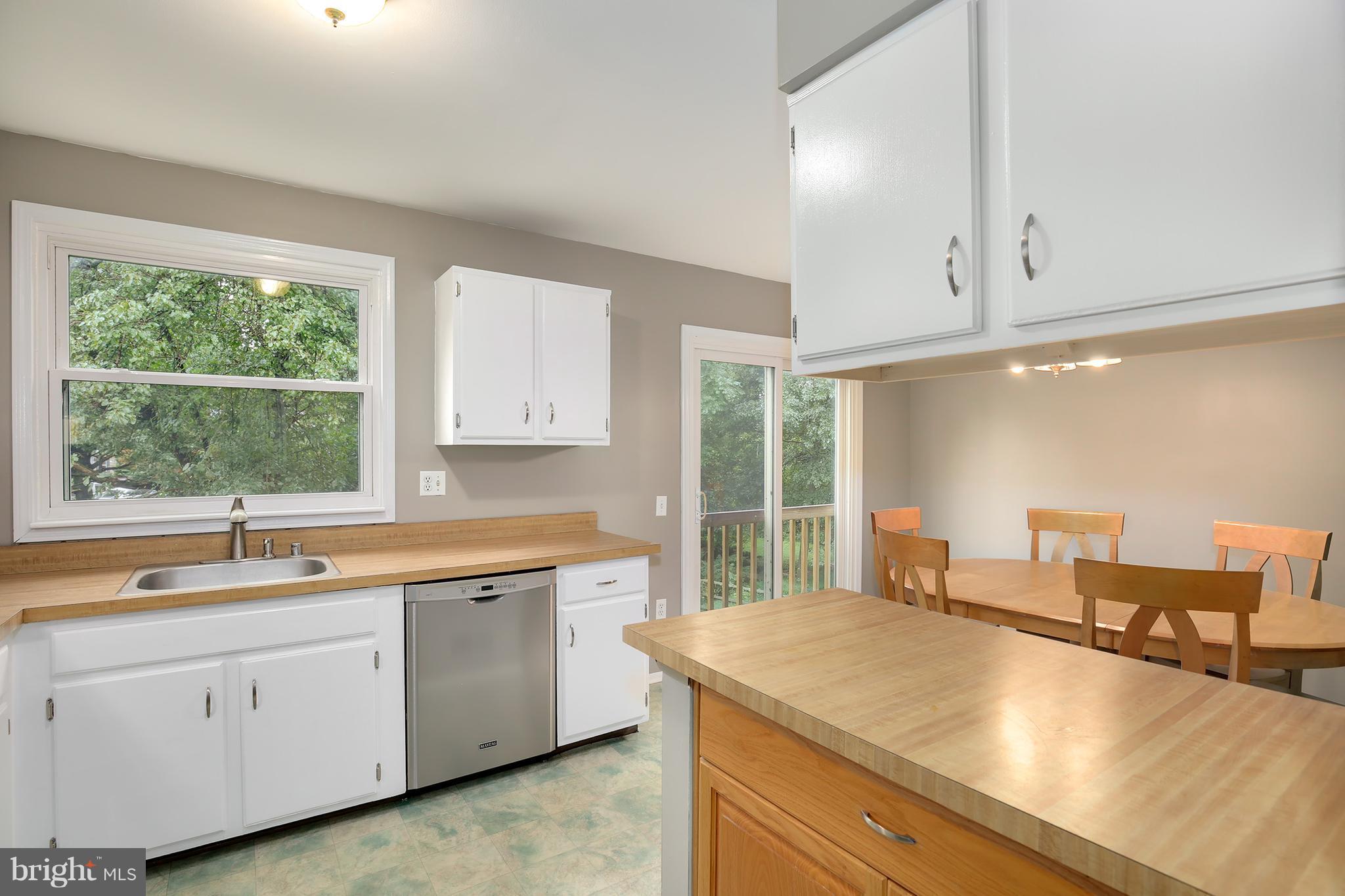 100 Applecreek Road Frederick, MD 21702 - Photo 16 of 30 a kitchen with a sink and cabinets