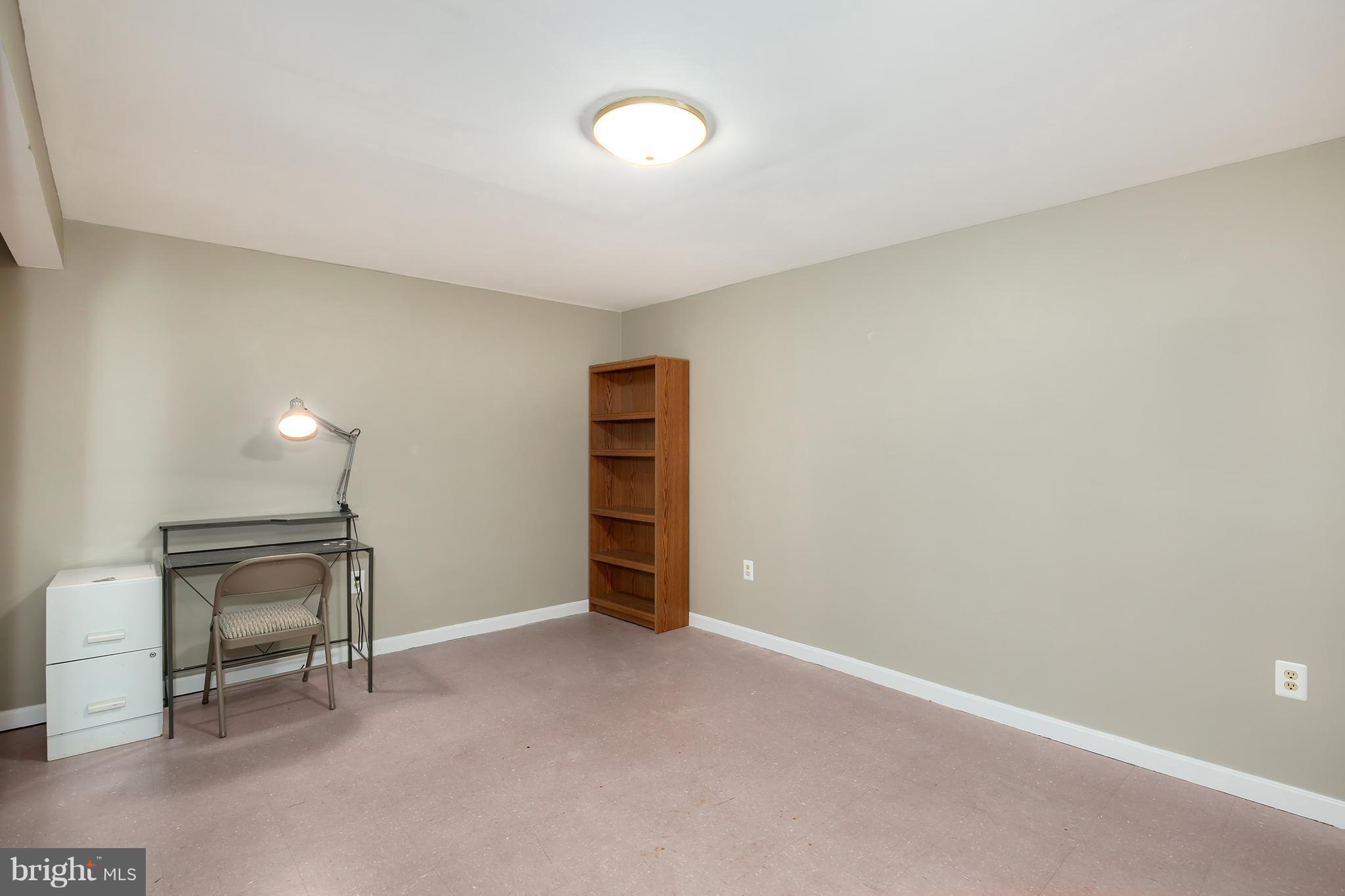 100 Applecreek Road Frederick, MD 21702 - Photo 26 of 30 a view of an empty room with a fireplace