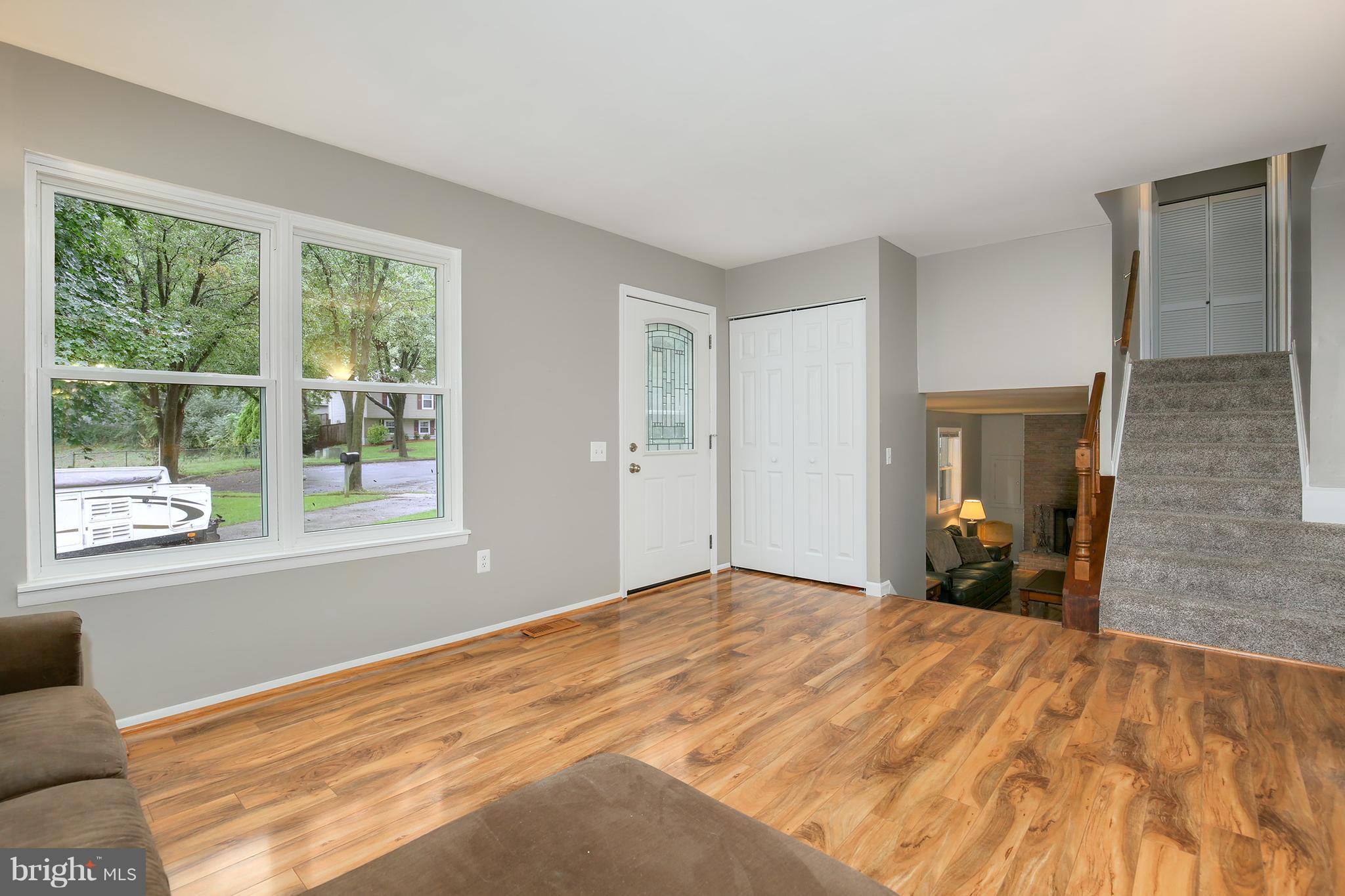 100 Applecreek Road Frederick, MD 21702 - Photo 4 of 30 a bedroom with a bed and a large window