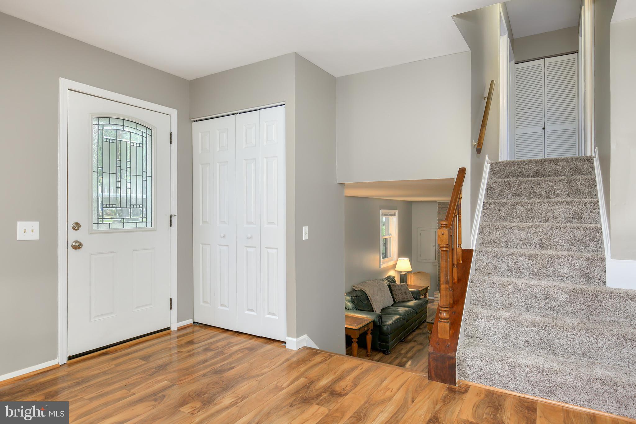 100 Applecreek Road Frederick, MD 21702 - Photo 5 of 30 a view of a livingroom with wooden floor and a couch