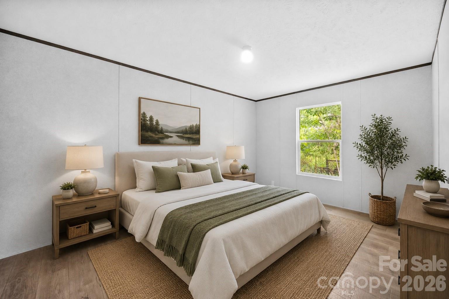 321 Bell Road Kings Mountain, NC 28086 - Photo 23 of 32 a bedroom with bed and a potted plant