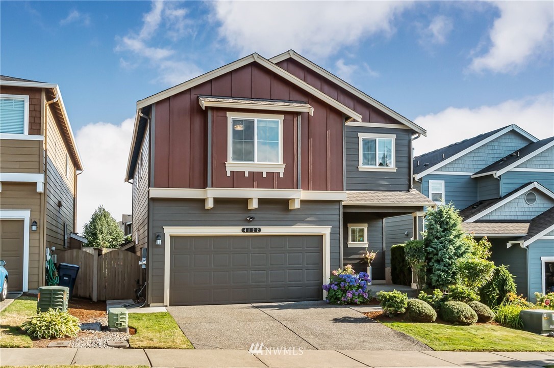 4122 167th Place Southeast Bothell, WA 98012 - Photo 2 of 40 a front view of house with yard