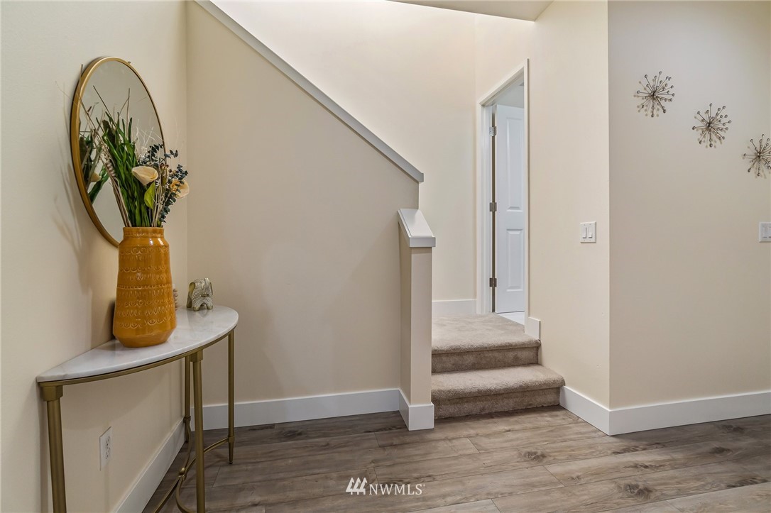 4122 167th Place Southeast Bothell, WA 98012 - Photo 19 of 40 a view of entryway with wooden floor