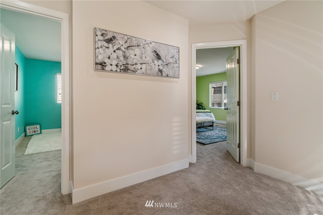 4122 167th Place Southeast Bothell, WA 98012 - Photo 20 of 40 an empty room and a bathroom with mirror