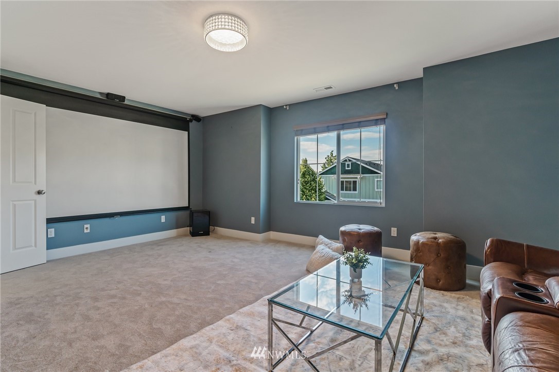 4122 167th Place Southeast Bothell, WA 98012 - Photo 32 of 40 a workspace with furniture and window