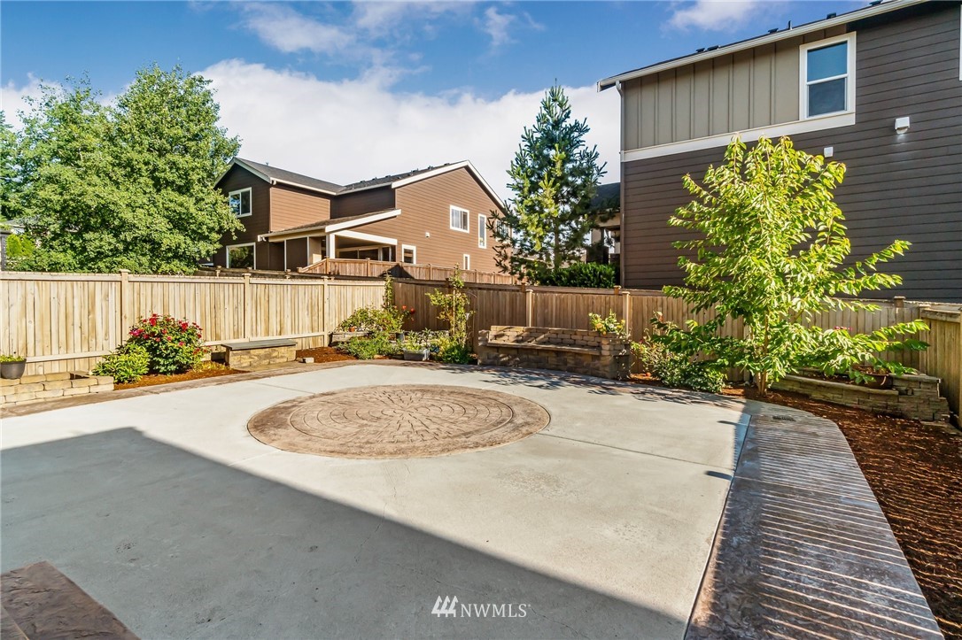 4122 167th Place Southeast Bothell, WA 98012 - Photo 38 of 40 a view of a house with a patio