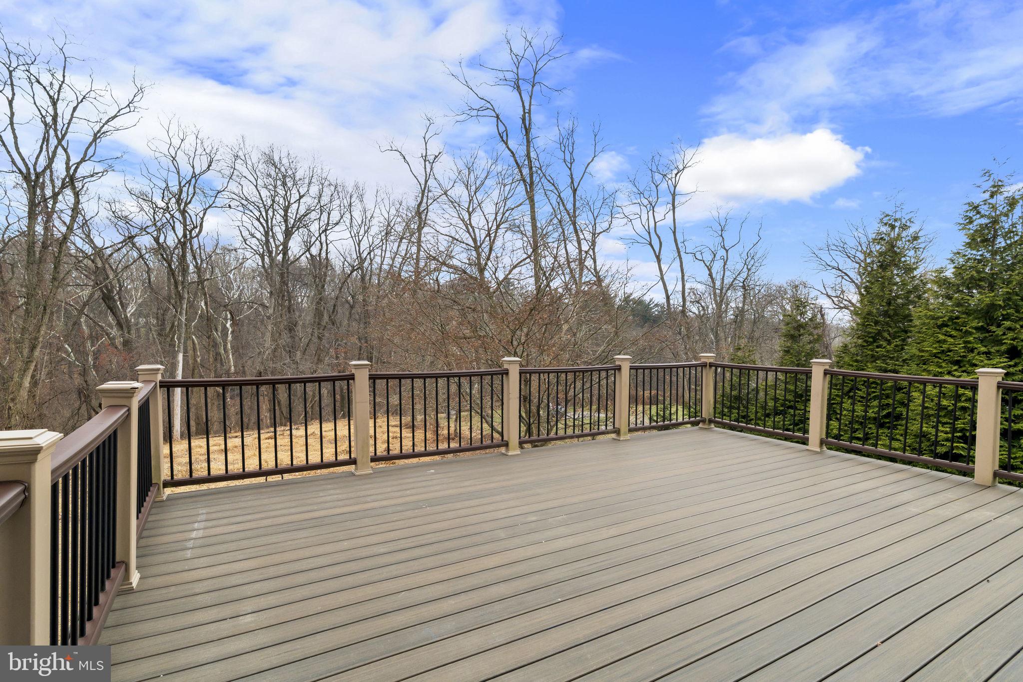 49 Langstoon Lane Media, PA 19063 - Photo 21 of 64 a view of a wooden roof deck