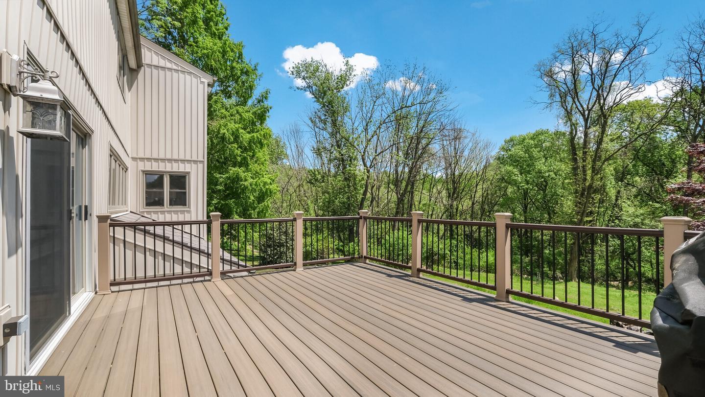49 Langstoon Lane Media, PA 19063 - Photo 22 of 64 a view of balcony with hardwood floor and trees