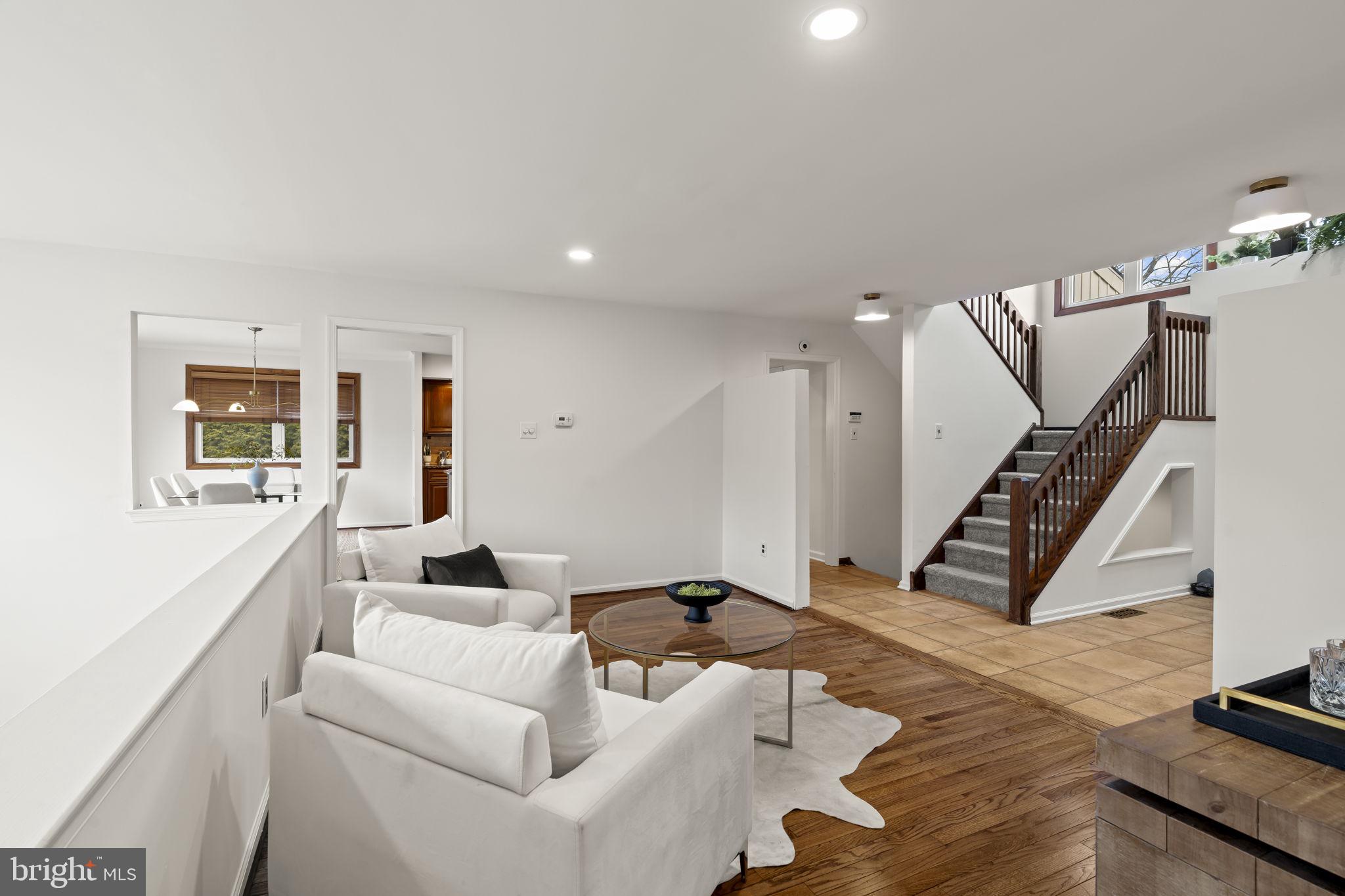49 Langstoon Lane Media, PA 19063 - Photo 3 of 64 a living room with furniture and a wooden floor