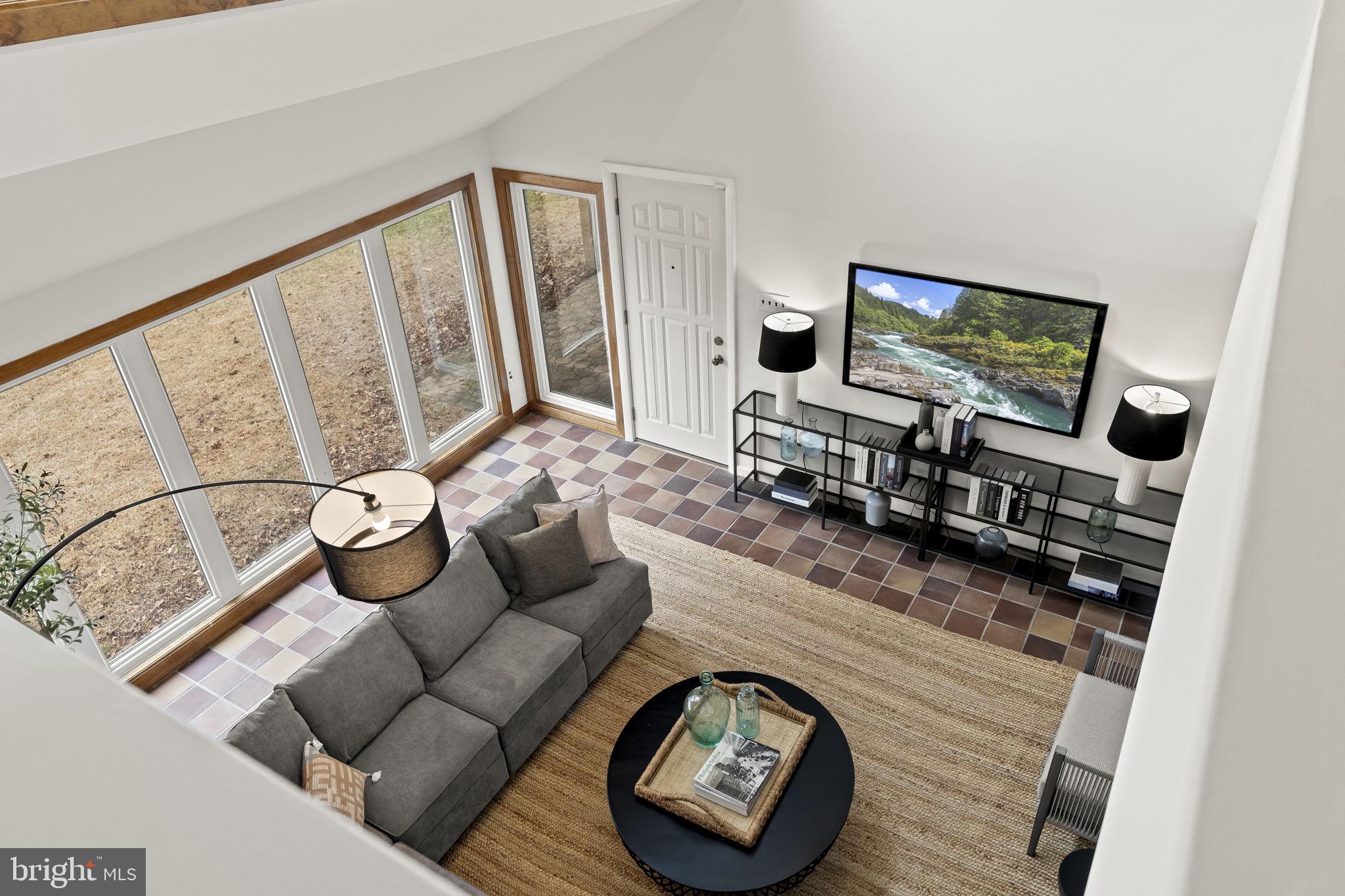 49 Langstoon Lane Media, PA 19063 - Photo 45 of 64 a living room with furniture and a flat screen tv